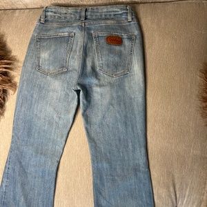 REPLAY FORM FITTING FLARED BOTTOM JEANS